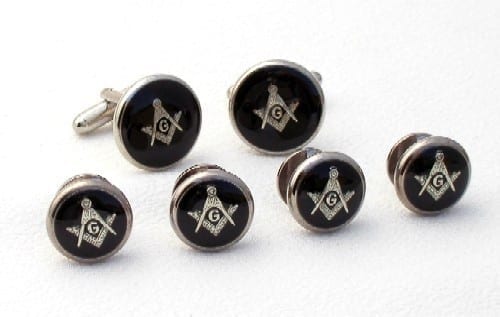 black cufflinks and studs